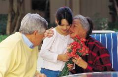 girl with grandparents